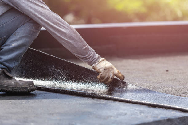 Professional Waterproofing technician working in Irons, MI